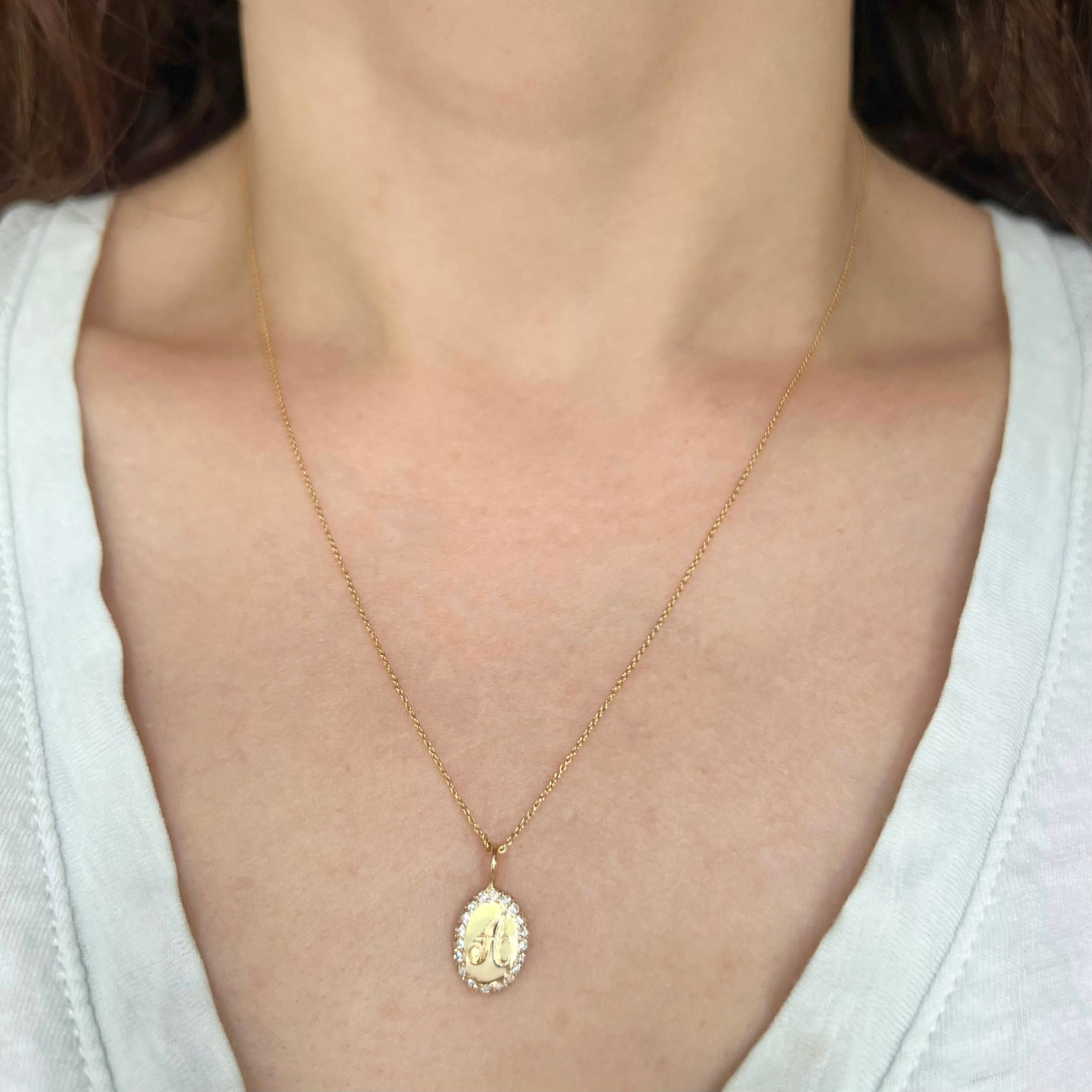 Wearing the Oval Charm Necklace