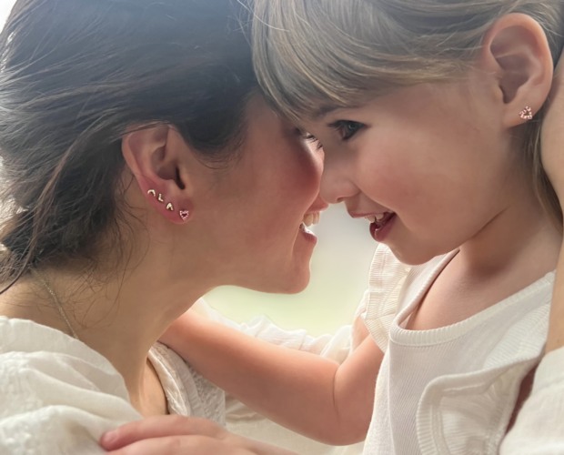 Wearing the Custom Tiny Open Heart Studs celebrating Mother's day