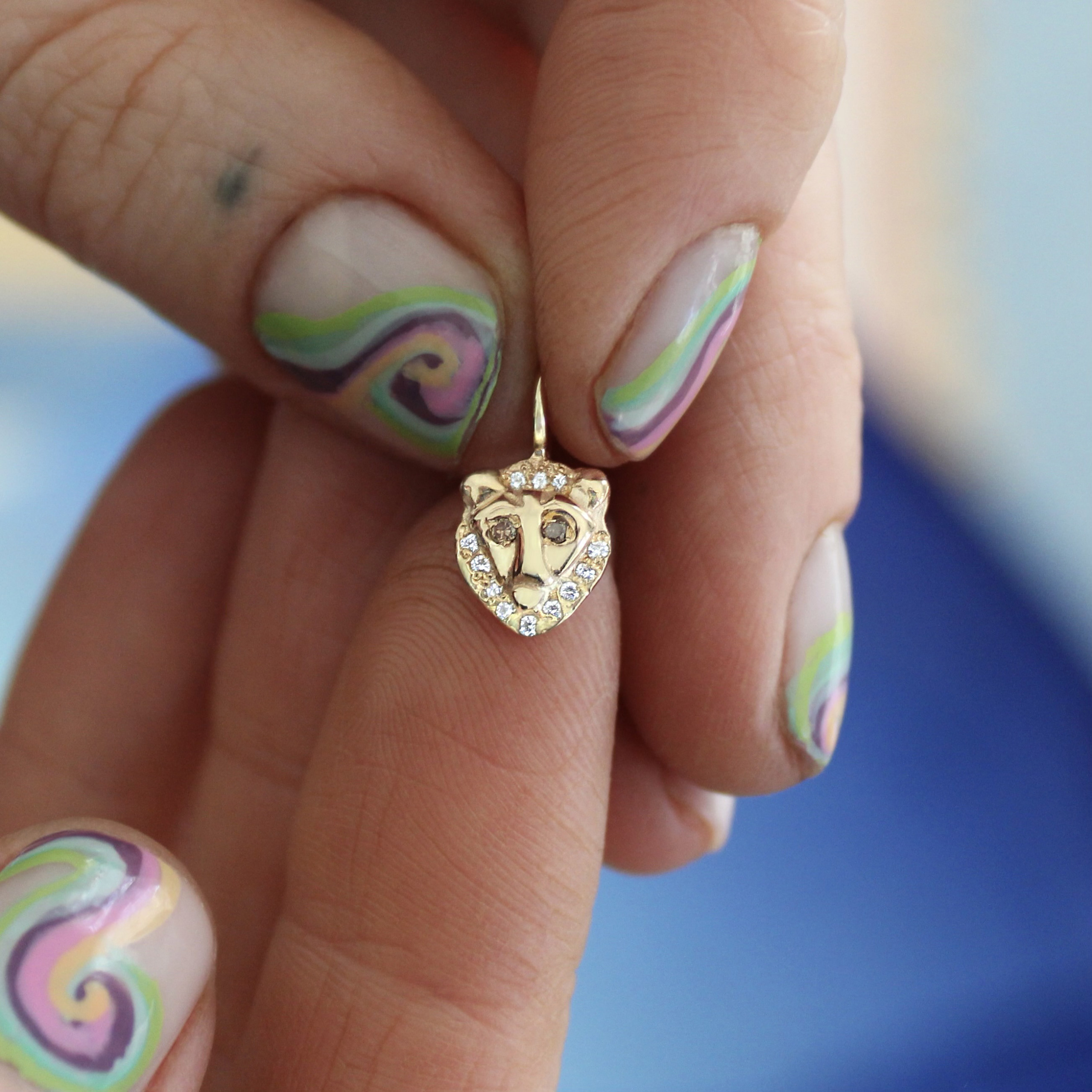 Holding the Lion Charm close-up