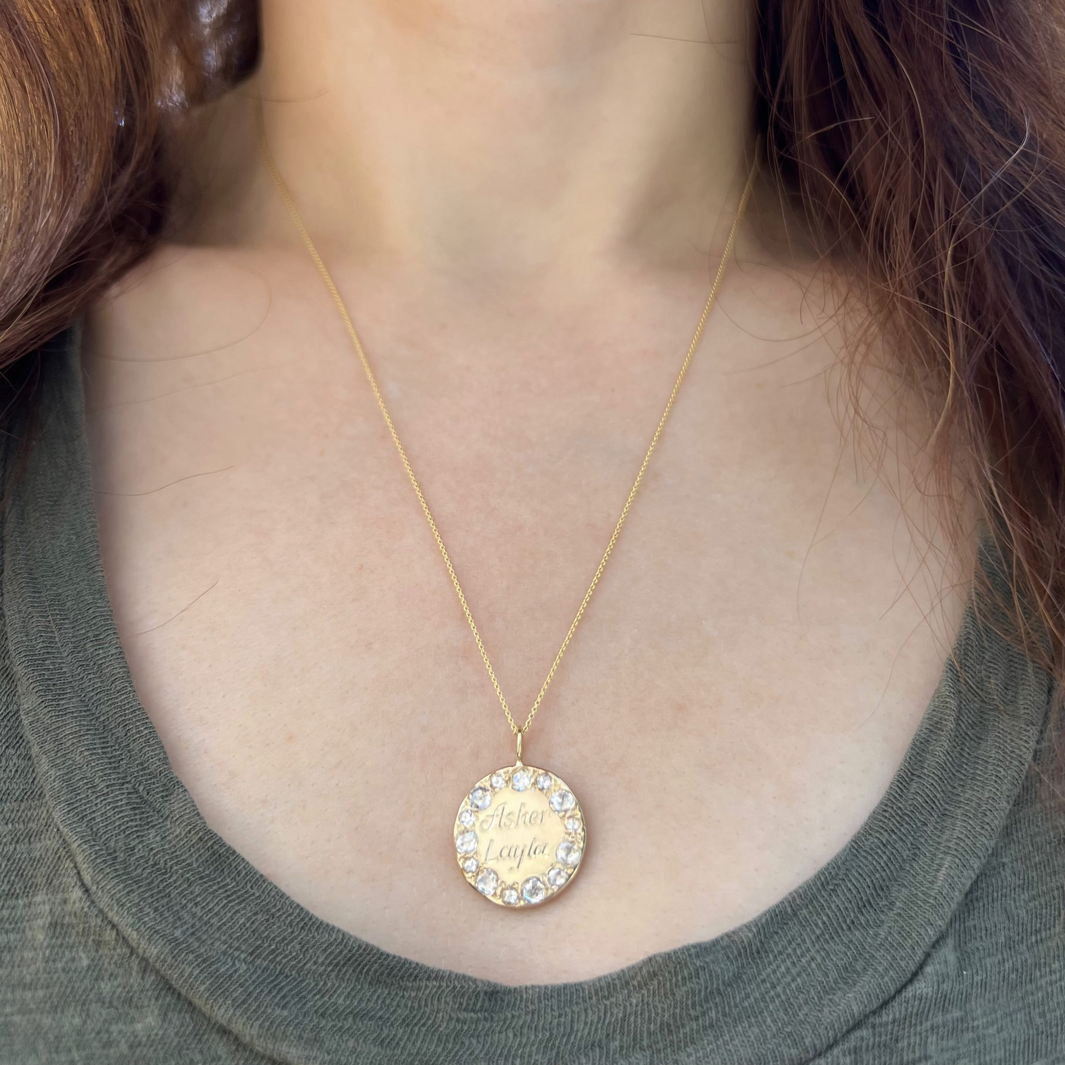 wearing the large circle charm