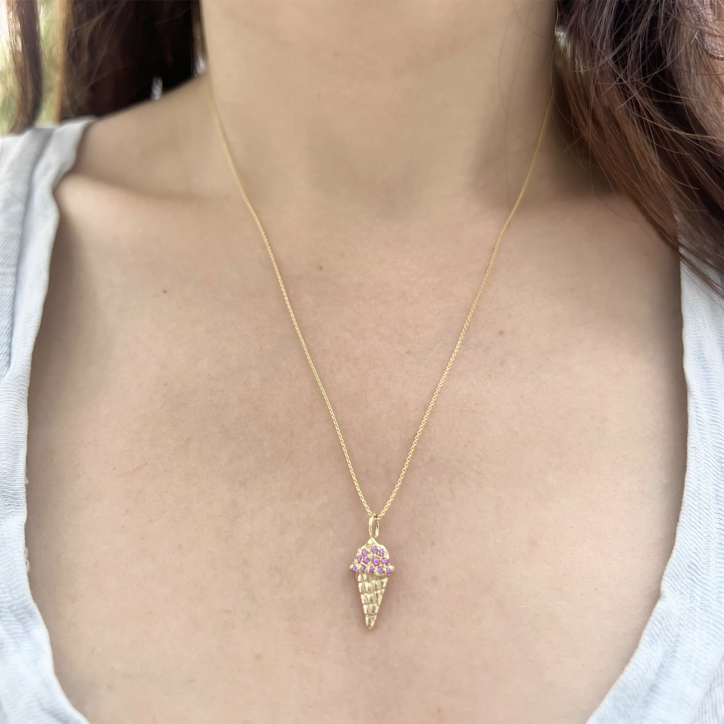 wearing the 14k yellow gold ice cream charm necklace