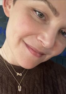 Ginnifer Goodwin wearing Elisa Solomon Jewelry large bunny charm and diamond jebrew name necklace