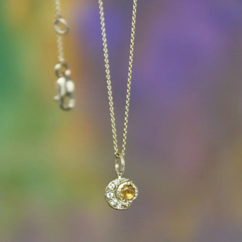 tiny-moon-sun-charm-on-a-chain-necklace